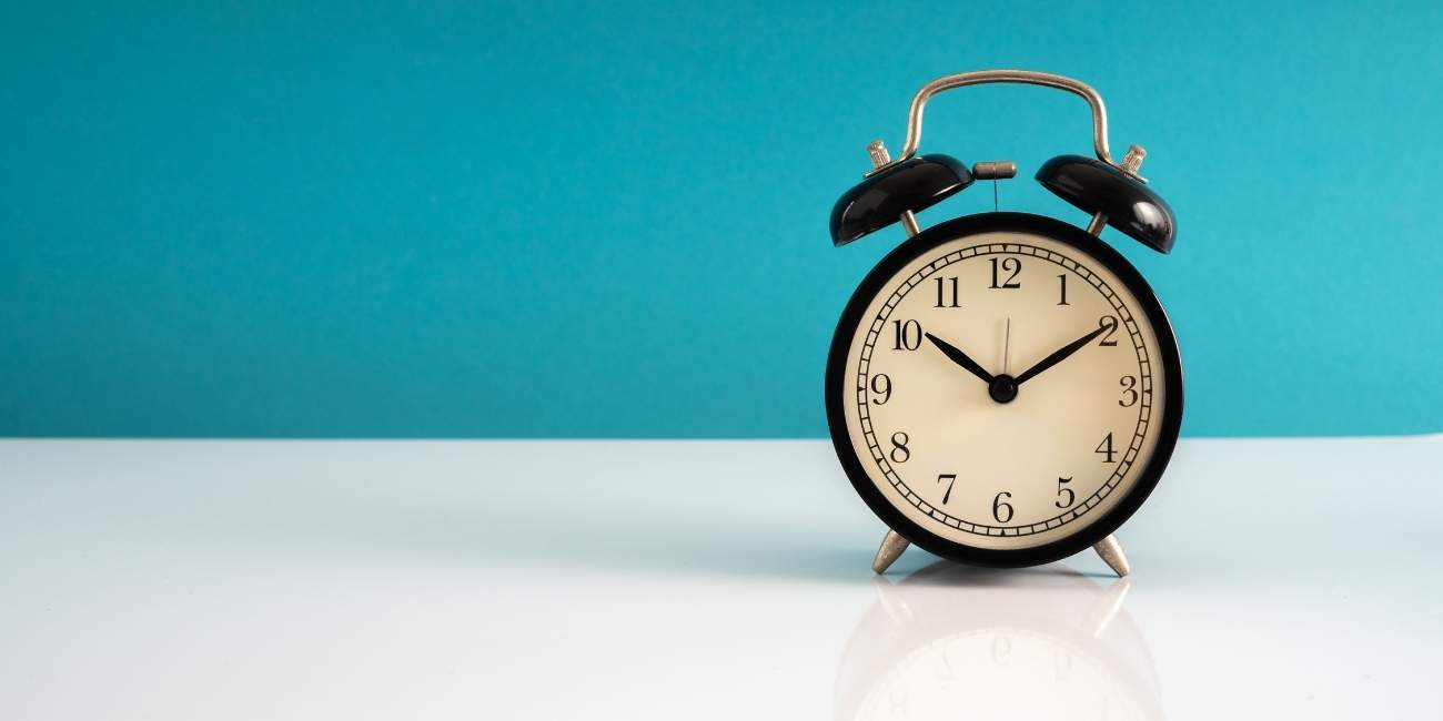 Photo of Alarm Clock on Desk