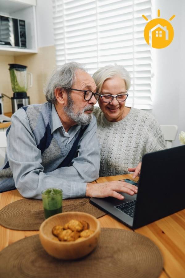 Photo of Older Couple on Computer, Sell Your Note