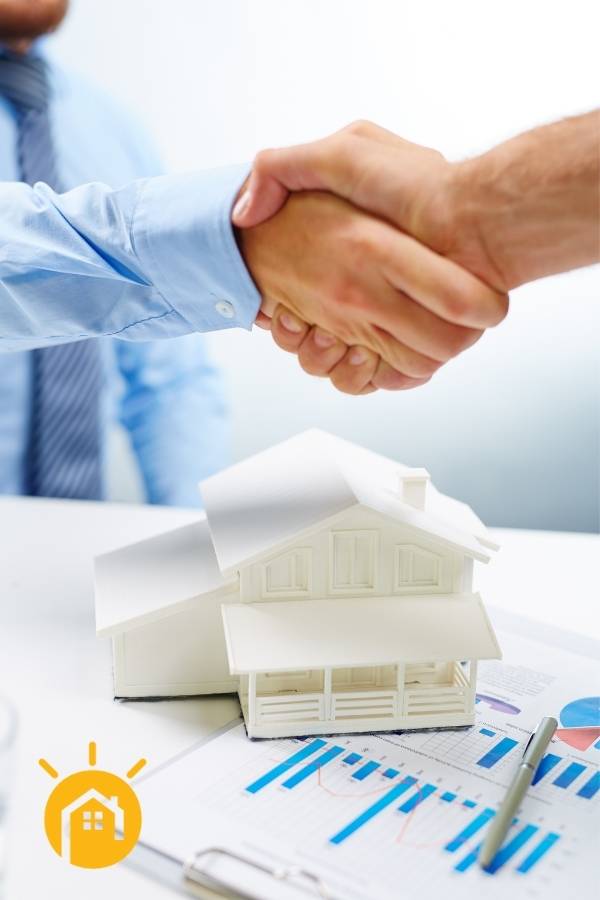 Photo of Handshake with Model Home